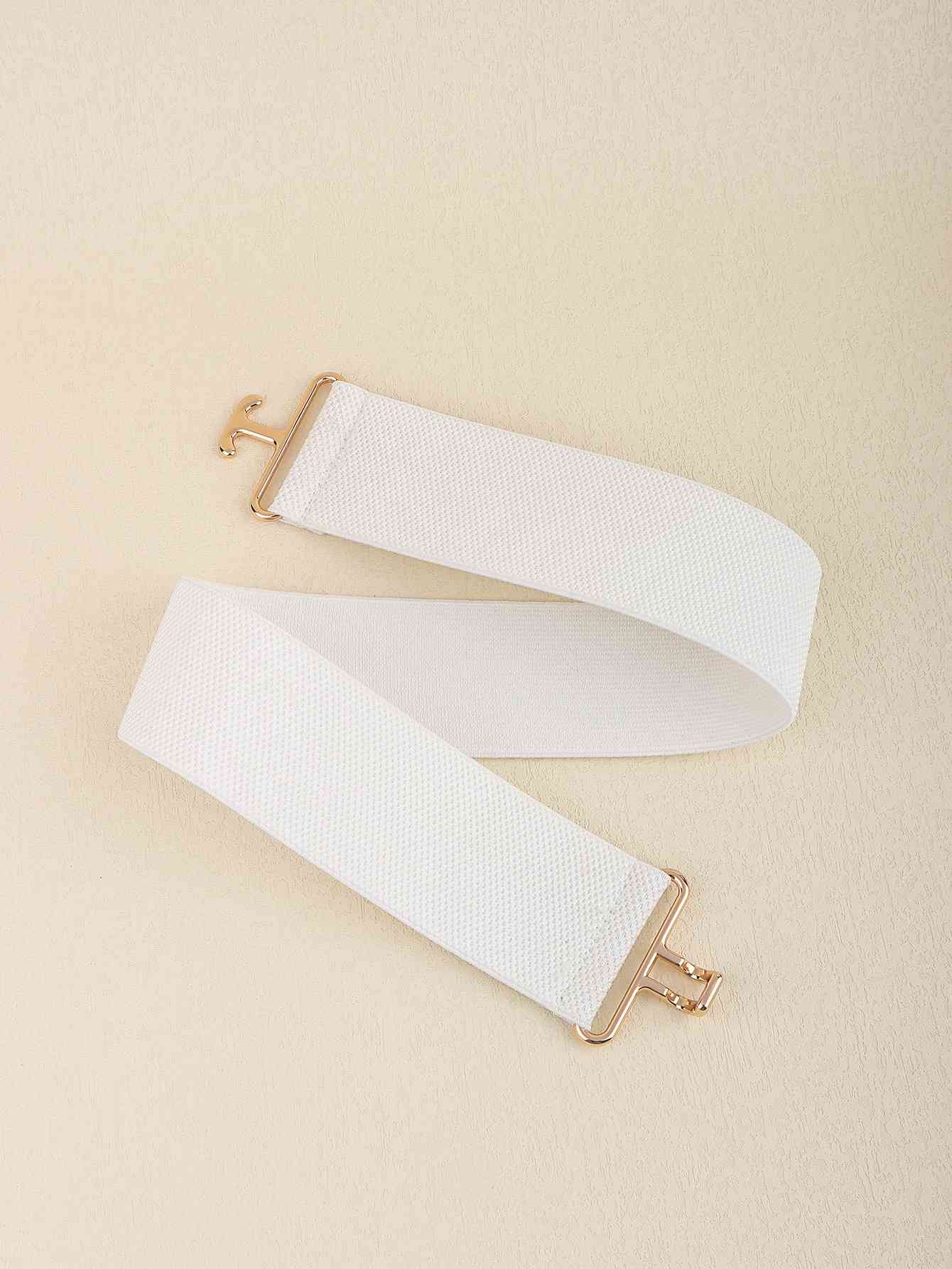 StylishFit Elastic Wide Belt – Adjustable Comfort and Chic Design See size chart under “more details” The Fashion Celestial