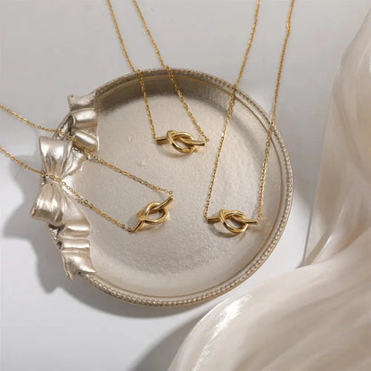 Solstice Knot Necklace Ivory Embers