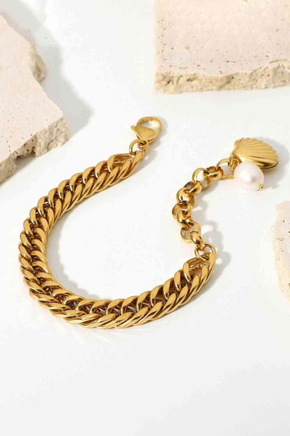 GlamGold 18K Gold-Plated Curb Chain Bracelet – Elegant Pearl Accent See size chart under “more details” The Fashion Celestial