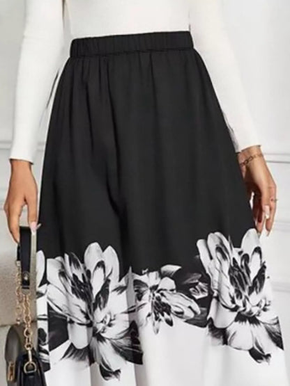Floral Print A-Line Midi Skirt See size chart under “more details” The Fashion Celestial