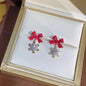 Silver Needle Zircon Snowflake Bow Earrings