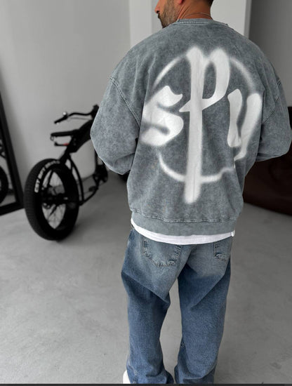 Unisex Oversize Sweatshirt with Pouch Pocket and Spray-Paint Design Withinblack