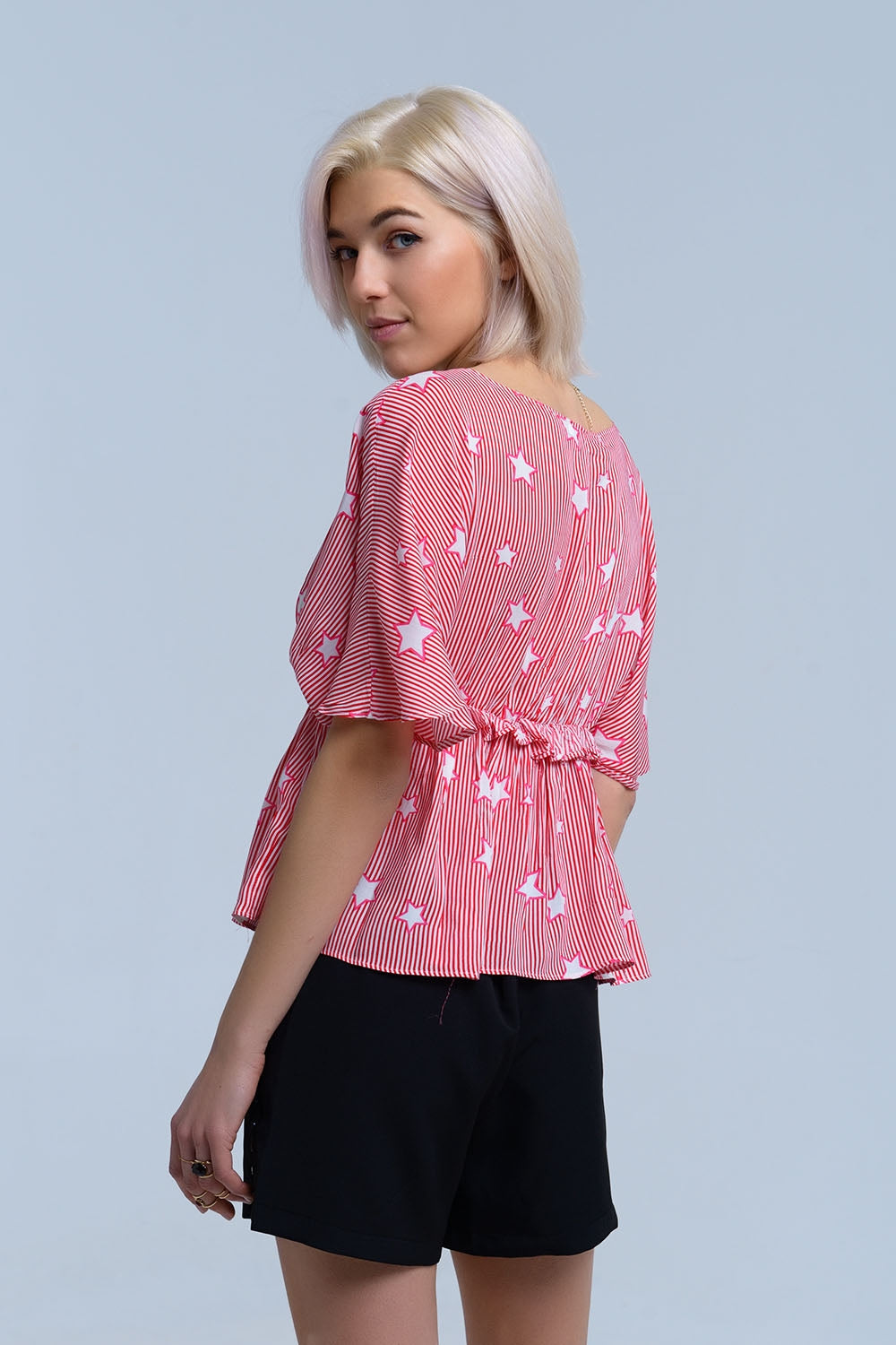 Red top with stars and ruffle Q2store