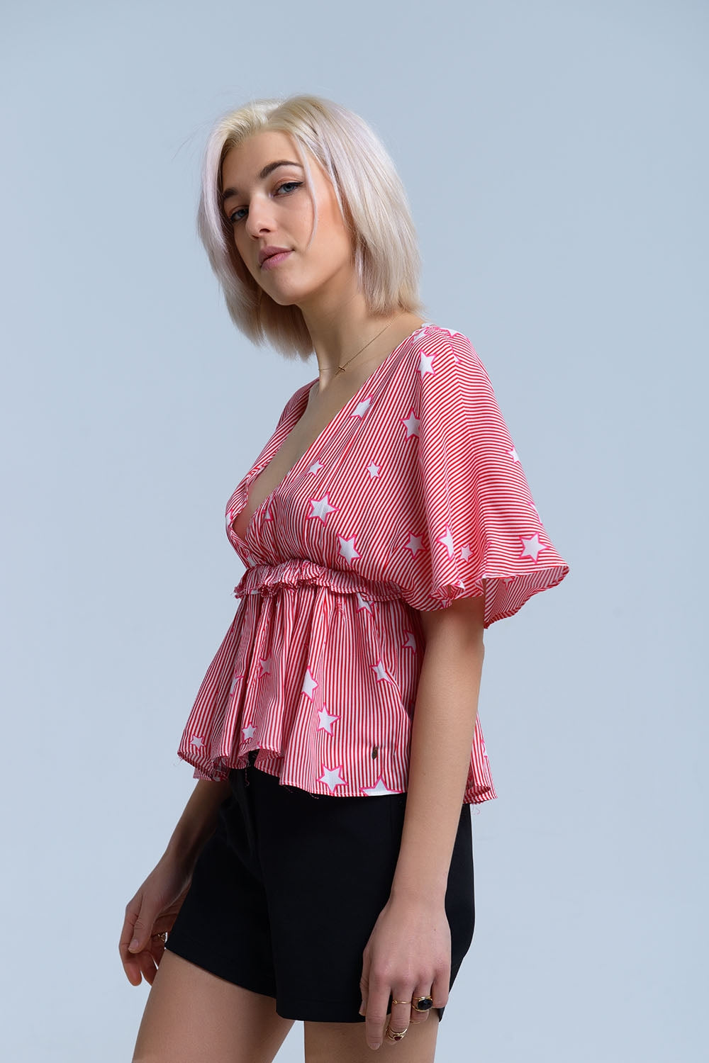 Red top with stars and ruffle Q2store