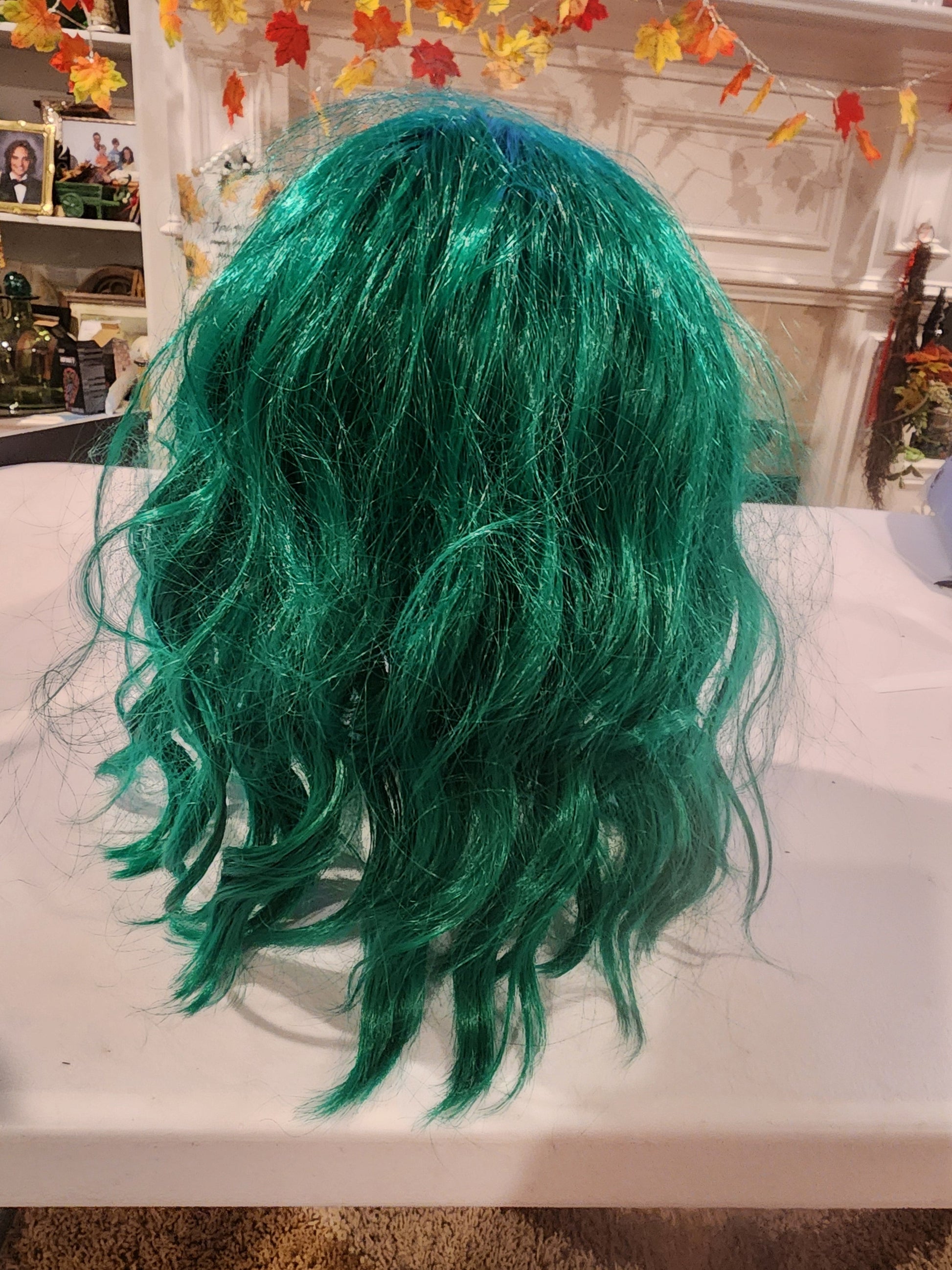 Green Wavy Wig with Bangs - Perfect for Cosplay, Halloween, or Parties Tennessee Junk Trunk