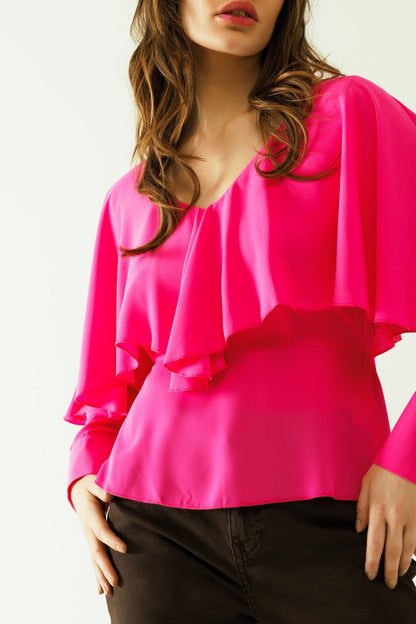 Ruffled V-neck top with buttoned cuffs and tie in the back detal in fuchsia Q2store