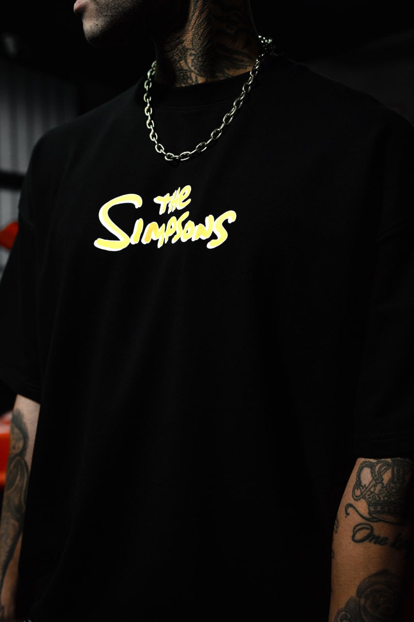 Mischief Icon Men's Graphic Tee – Tattooed Character Streetwear with Attitude Withinblack